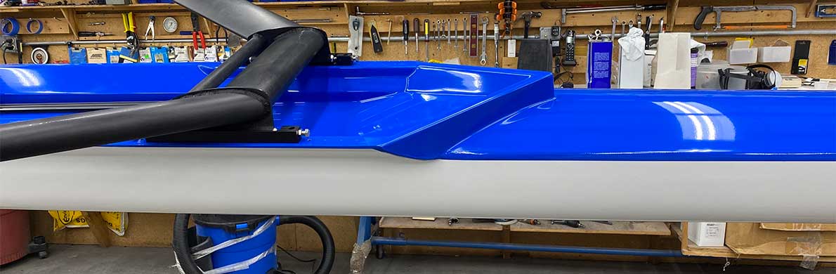 White hull blue deck, stripe matches deck